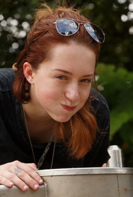 Sweet redheaded amateur girl Kelsey Berneray exposes her mesmerizing big tits